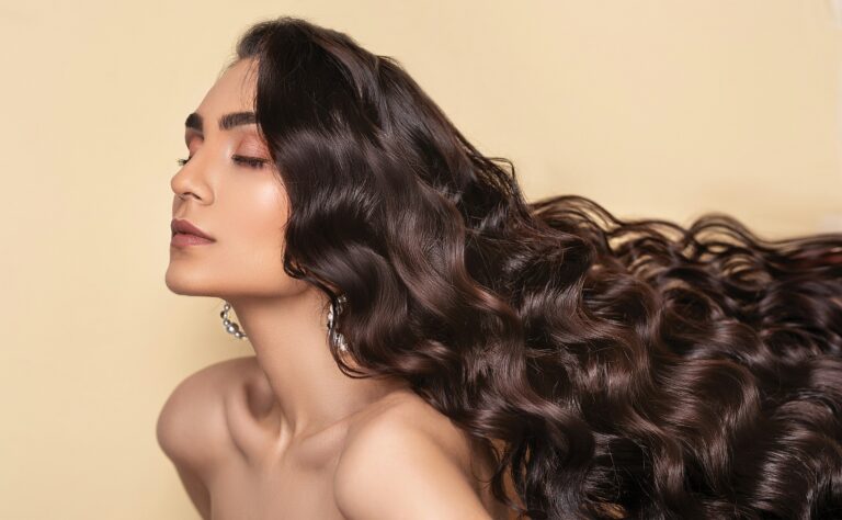 women with long hairs having her eyes closed