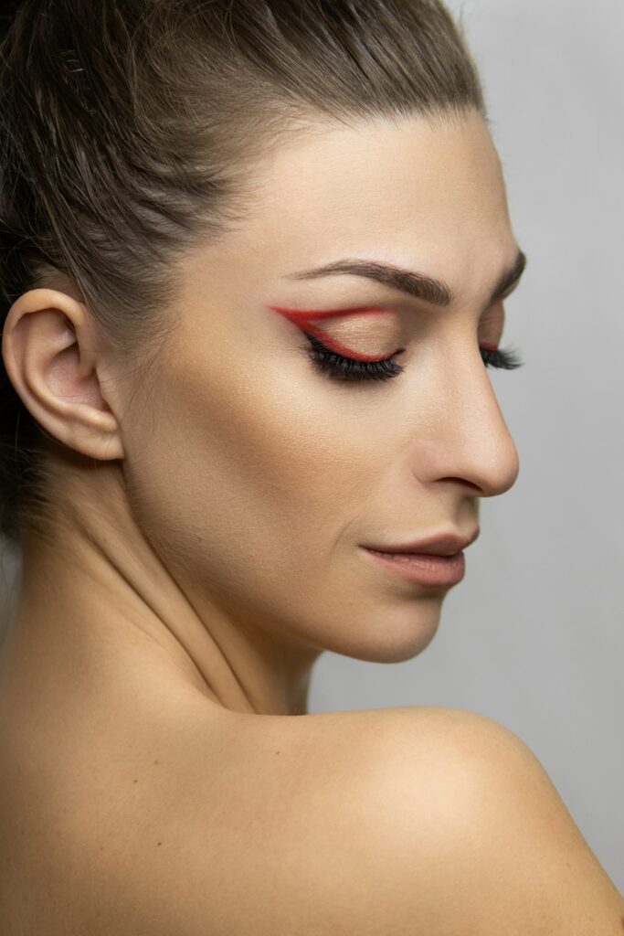 women with beautiful red eye liner
