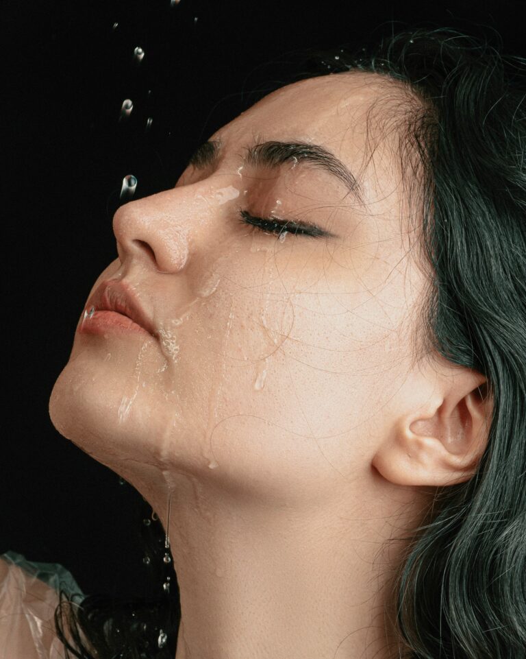 women cleaning face