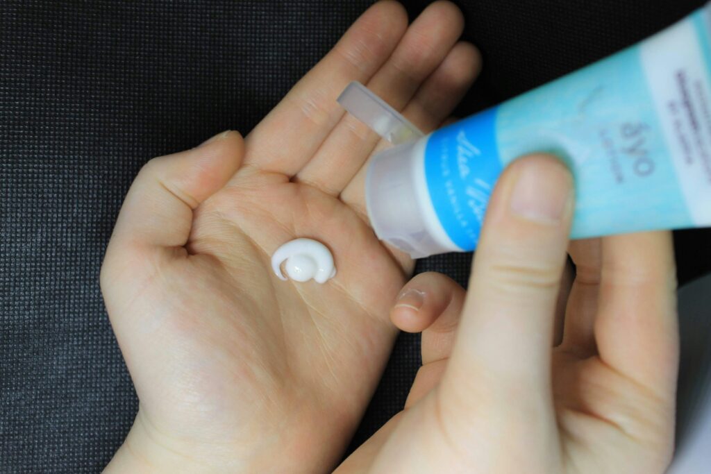 moisturizer squeezed on hands
