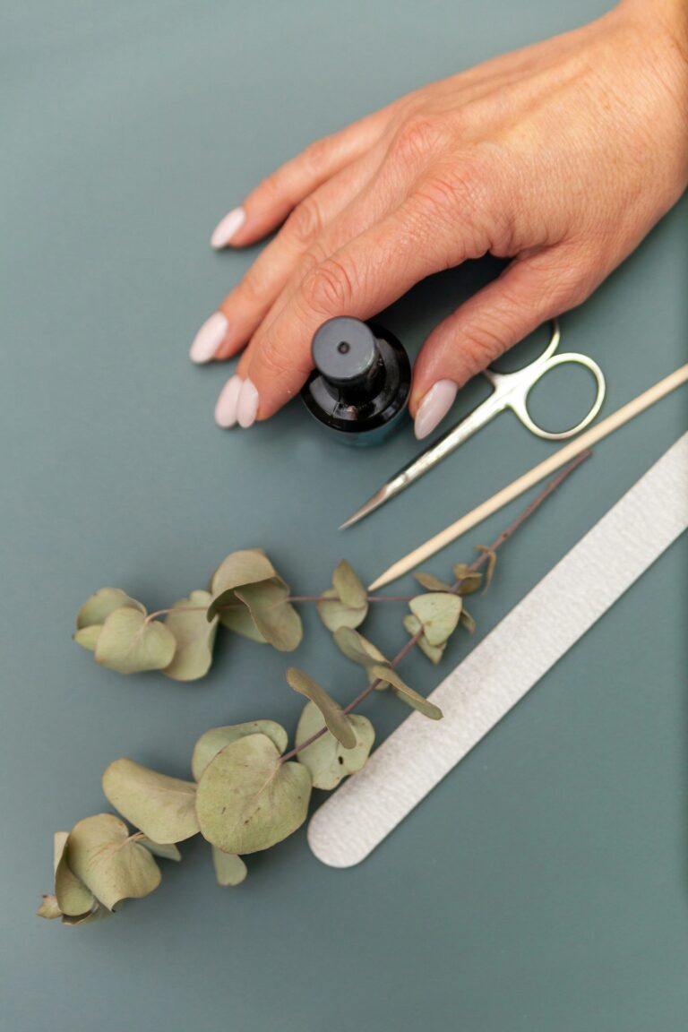 women hands on display with nail tools and nail dehydrator