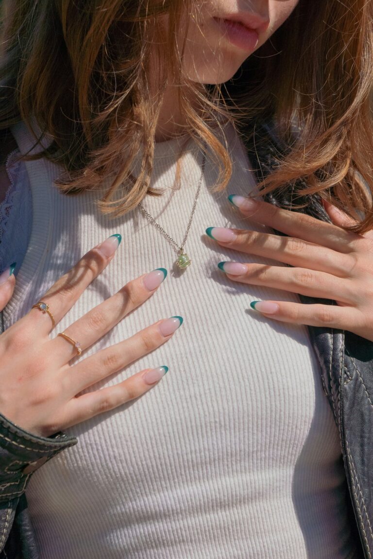 women showing off her beautiful long nails