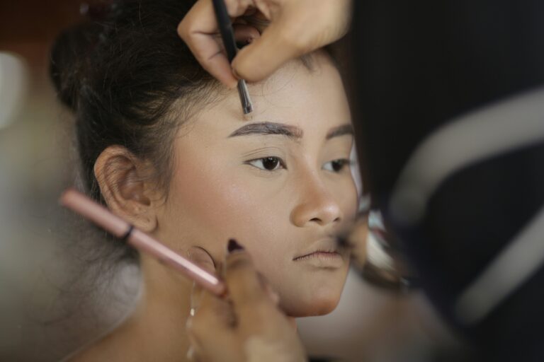 women in makeup acne hidden with foundation