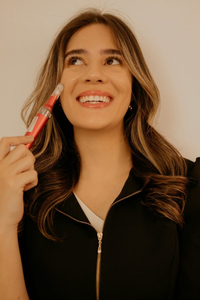 women smiling and holding matt lipstick