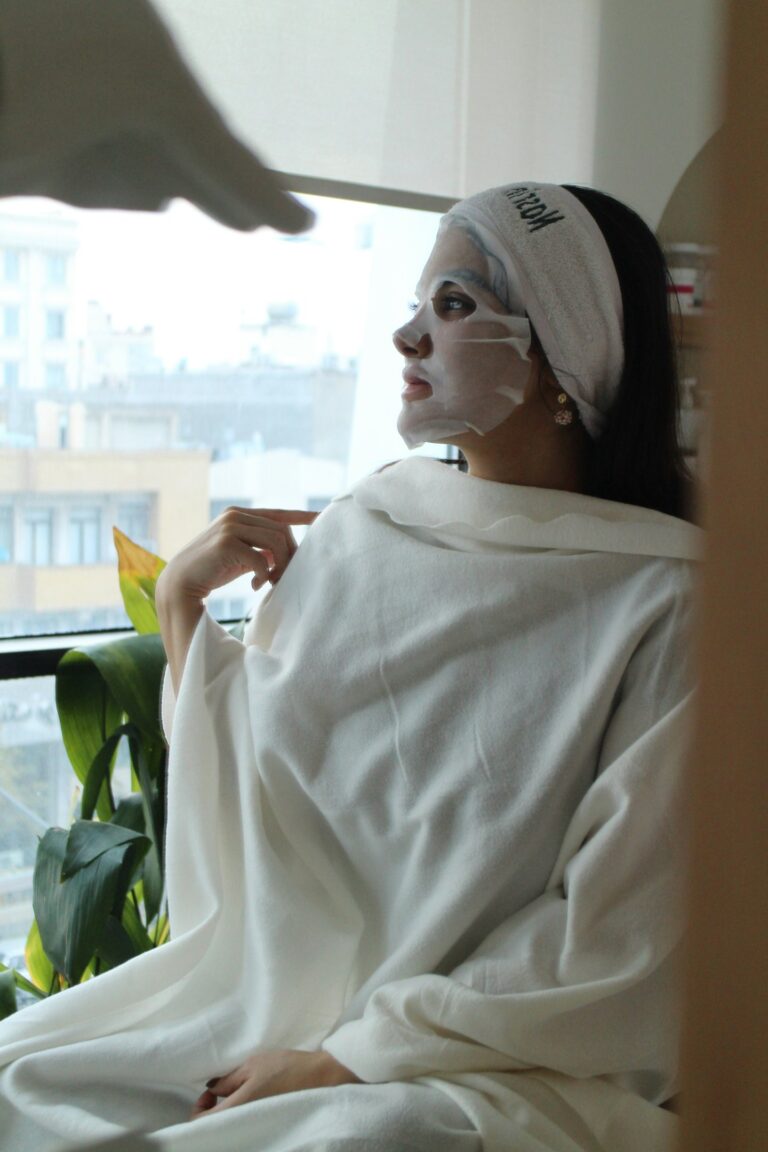 women sitting with face mask