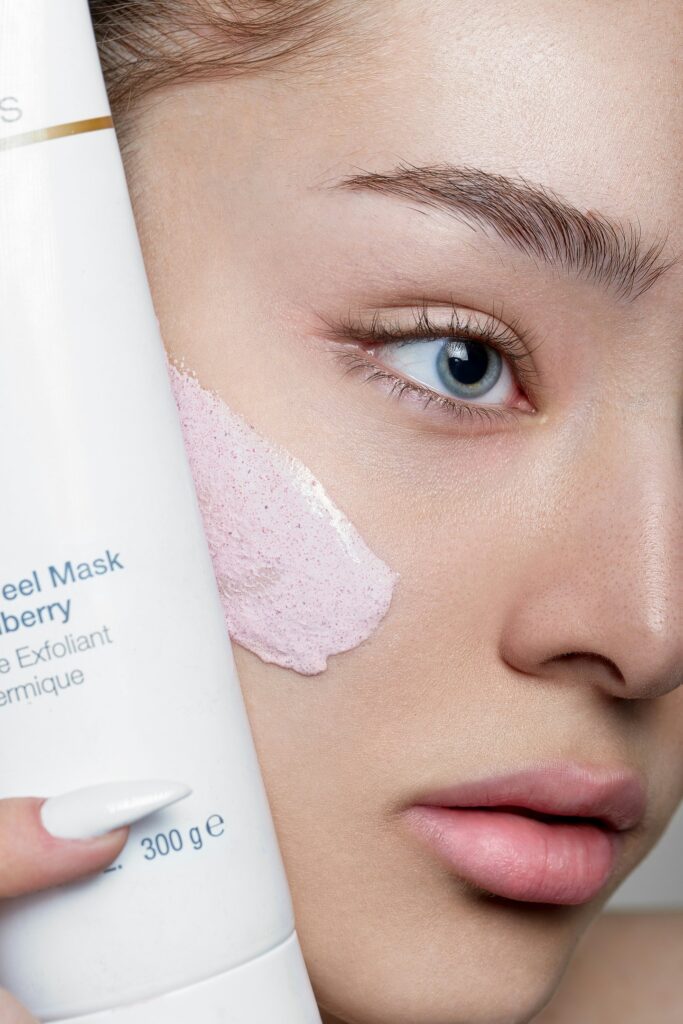 women applying strobe cream prep before makeup