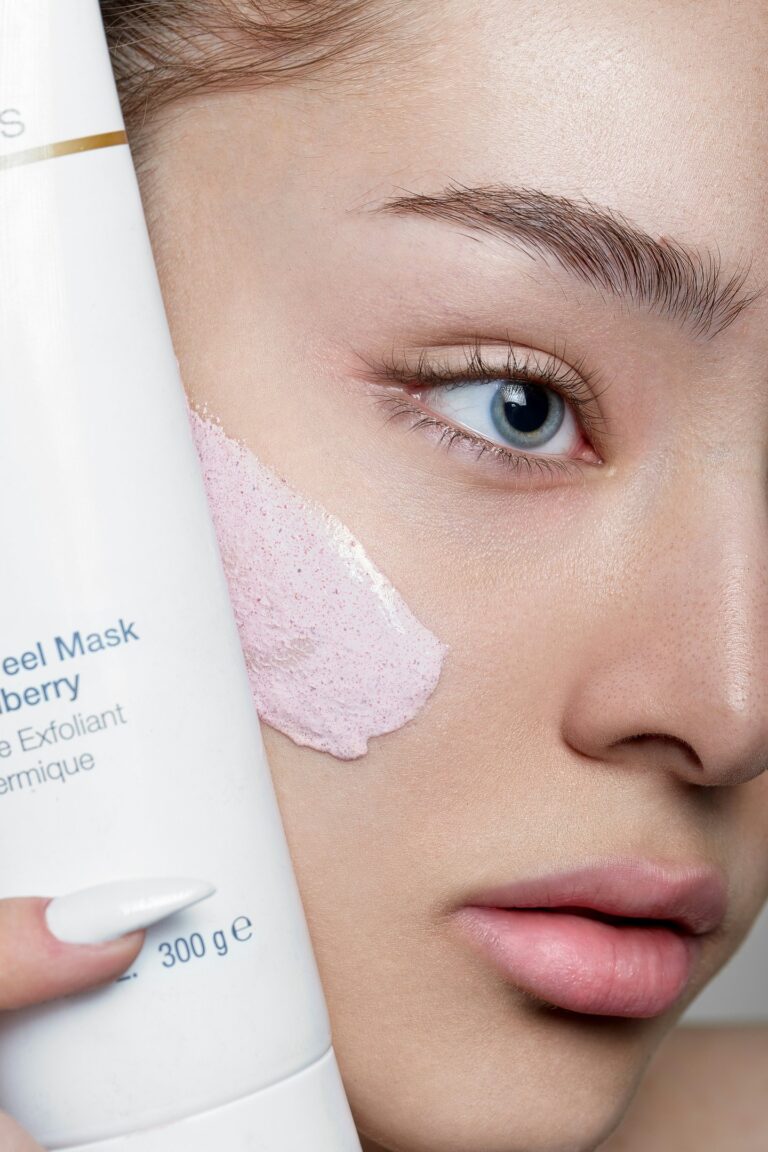 women applying strobe cream prep before makeup