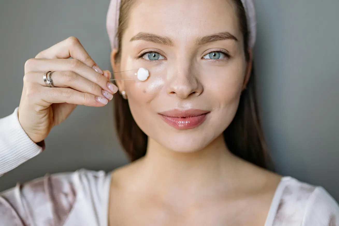 Applying moisturizer for beginner skincare routine