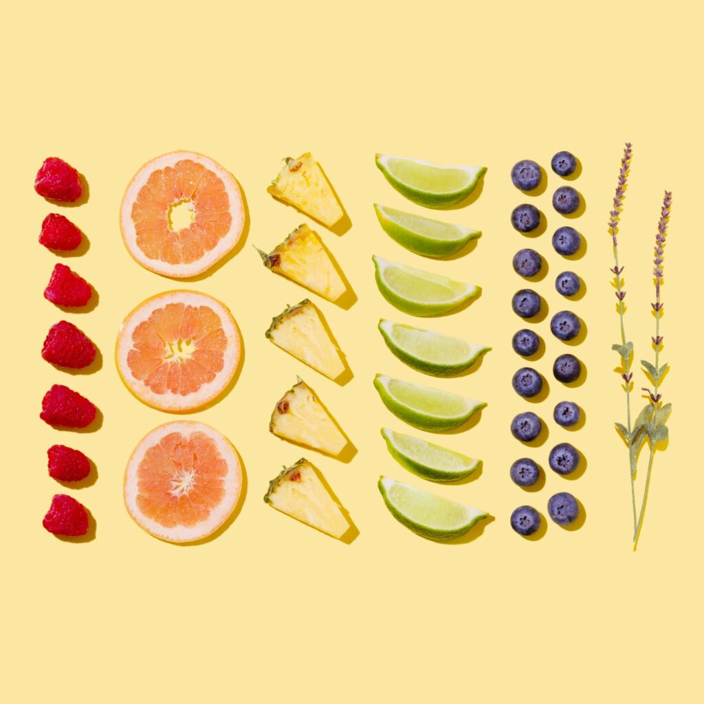slices of different fruits on subtle background