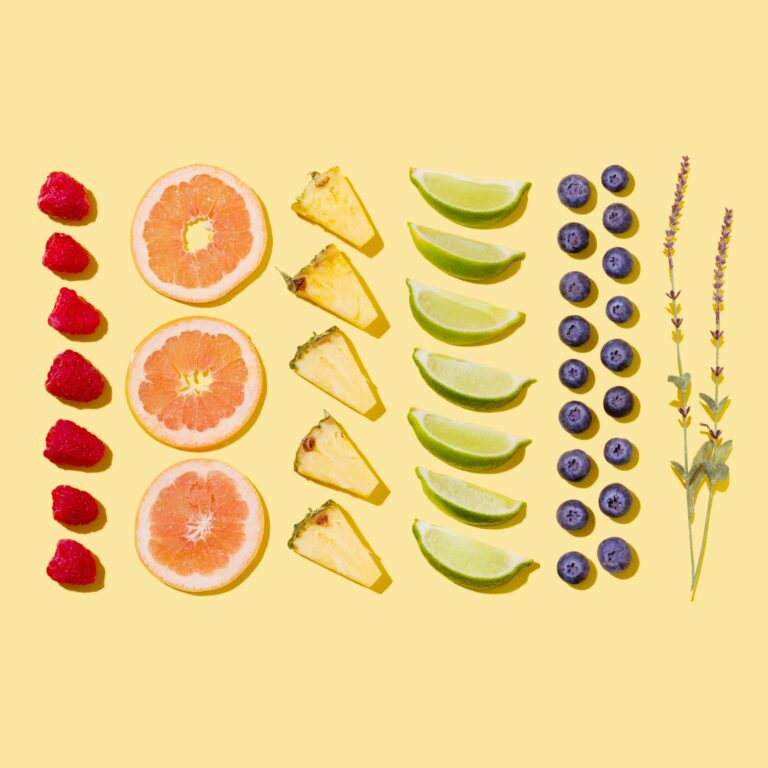 slices of different fruits on subtle background